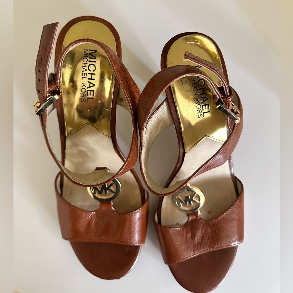 Michael kors high heels with Gold MK emblems on front open toes